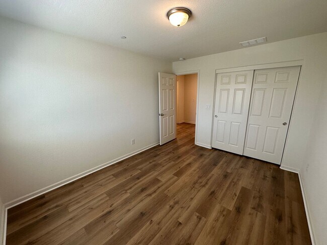 Building Photo - Stunning 4 Bedroom, 3 Bath Gated Community W/ Solar