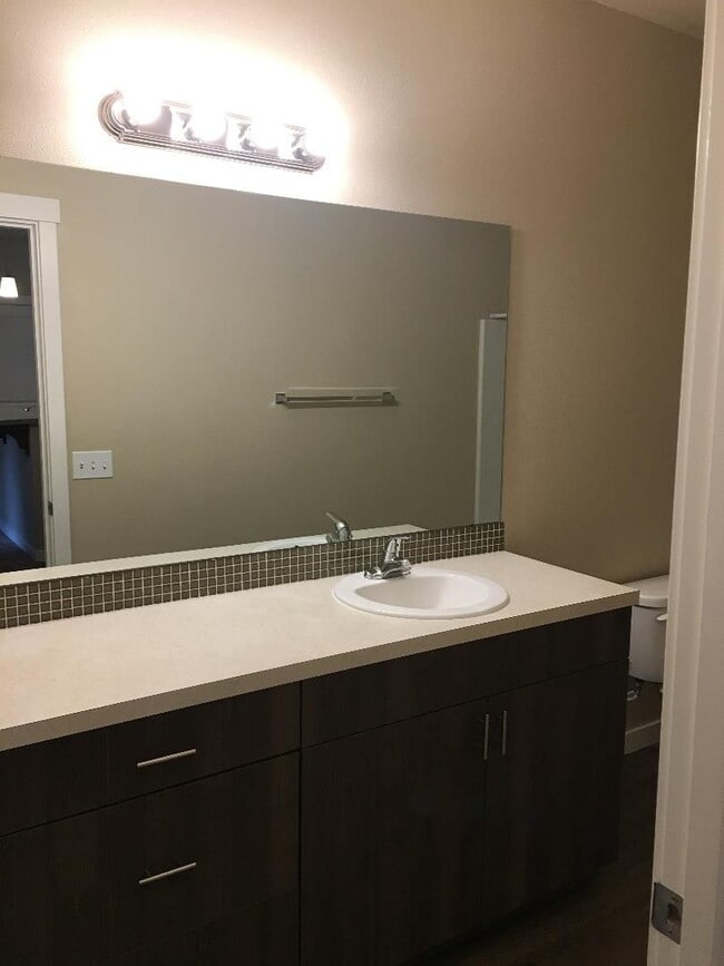 Building Photo - Stunning 1-Bedroom with Upscale Interiors & Open Island Kitchen!