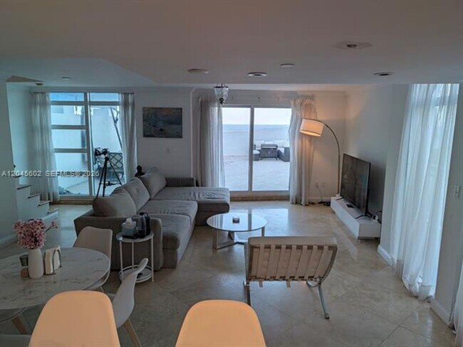 Building Photo - 7600 Collins Ave