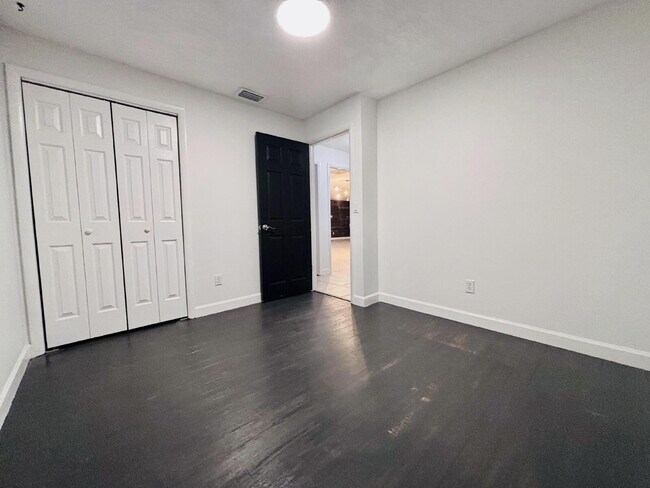 Building Photo - Coastal 4-Bedroom Oasis – Walk to the Beach!