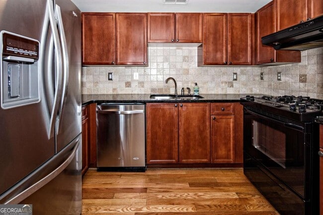 Building Photo - 4248 River Green Dr NW