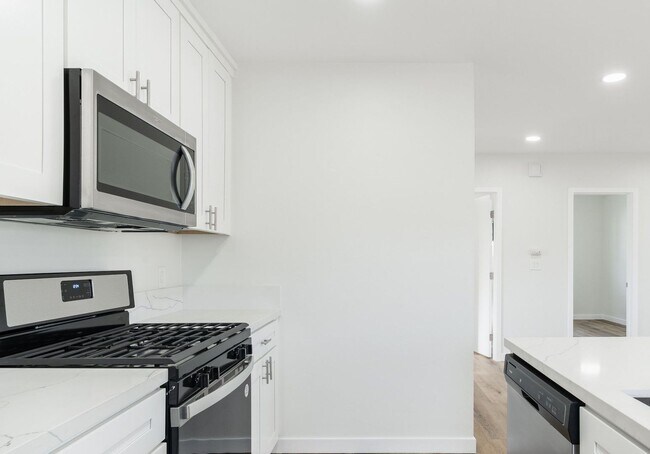 Building Photo - Welcome to your beautifully renovated single level home in the heart of Oceanside!