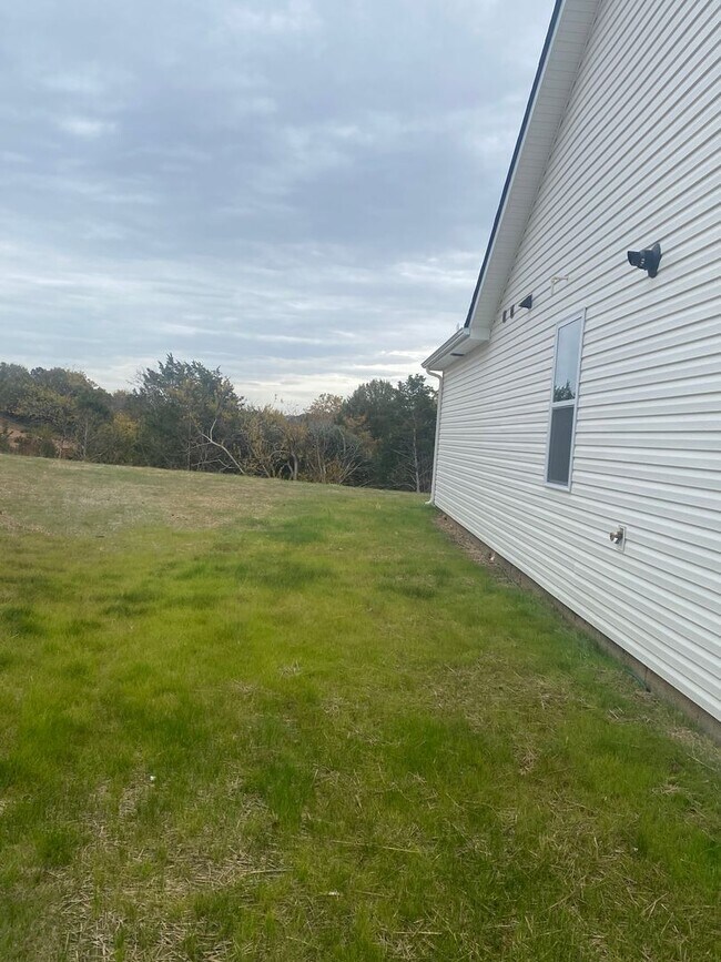 Building Photo - Brand New Construction - 4 bedroom 2 full ...