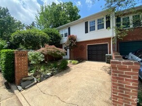 Building Photo - A fully updated Four Bedroom, Three and On...