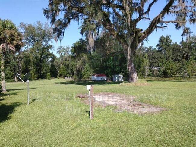 Building Photo - 6455 NW 135th Ave