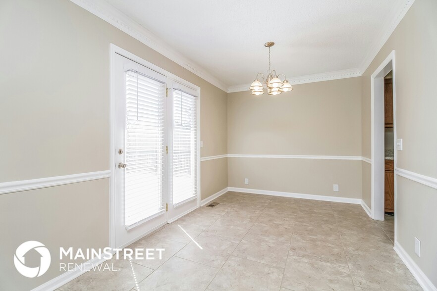 Building Photo - 5001 Pebble Creek Dr