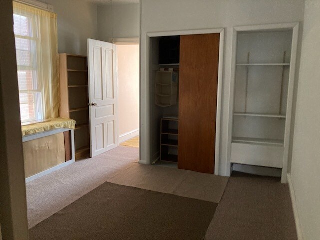 Center room, dining area or office, new carpeting, large closet with organizers, book shelves - 227 Buckingham Pl