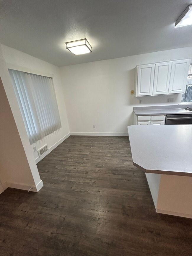 Building Photo - Beautifully Remodeled 2 Bedroom 1 Bath Duplex w/ Large Yard!! Pets are welcome! Electric car char...