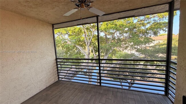 Building Photo - 6090 N Sabal Palm Blvd