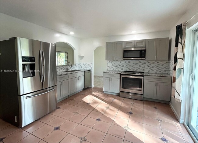 Building Photo - 6452 Royal Palm Beach Blvd