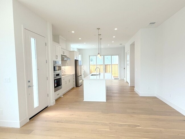 Building Photo - Newly Built ! Be The First To Live Here ! Modern Detached Home In New City Village !