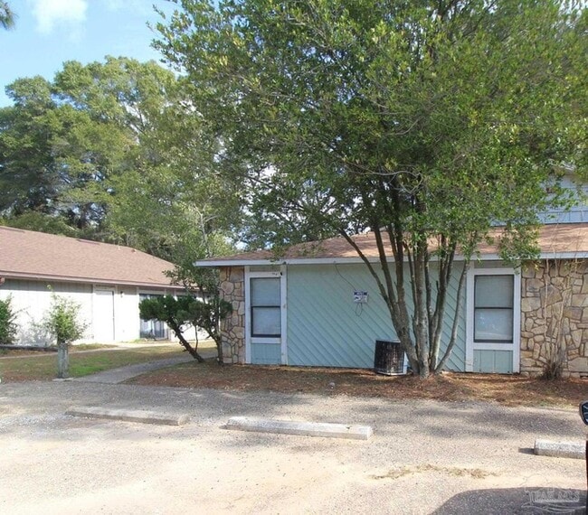 Building Photo - 6810 Tiki Ln