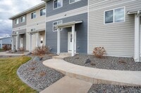 Building Photo - SPACIOUS AND MODERN TOWNHOME