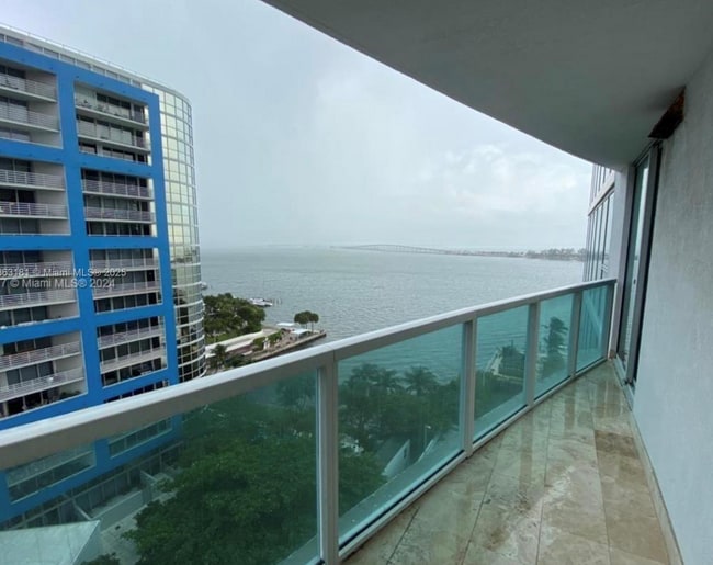 Building Photo - Furnished 1BR Condo with Stunning Bay View...