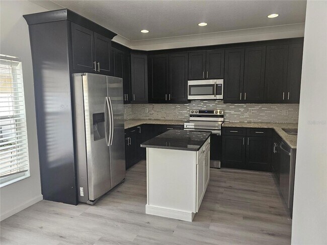 Building Photo - 9153 Oak Fern Dr