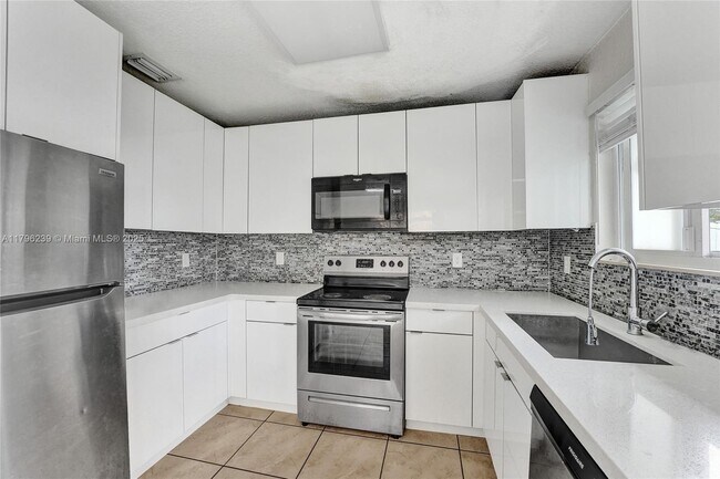 Building Photo - 1154 NW 103rd St
