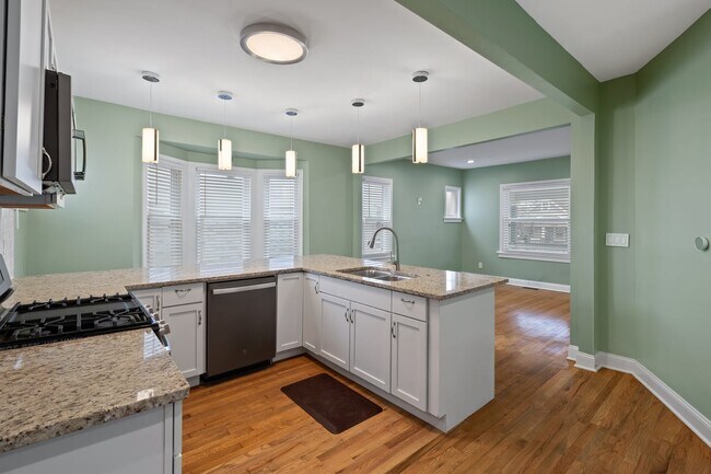 Gourmet kitchen with all new appliances and granite countertops - 4517 Tracy Ave