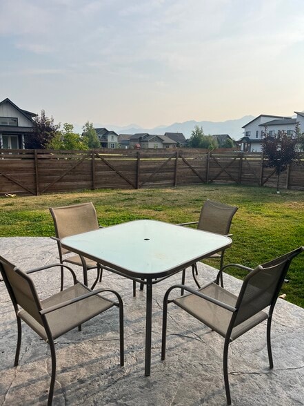 fenced backyard with patio - 3168 Fen Way