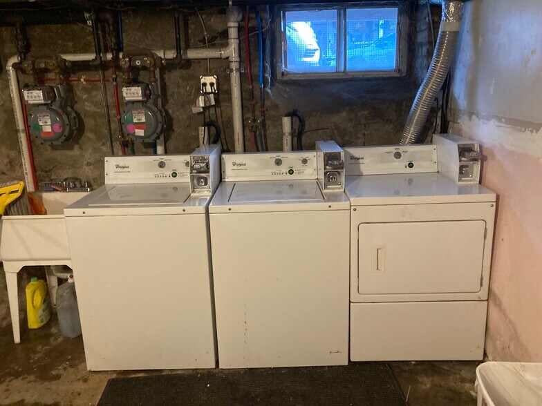 Coin operated Laundry Room in Basement - 21 Congress St
