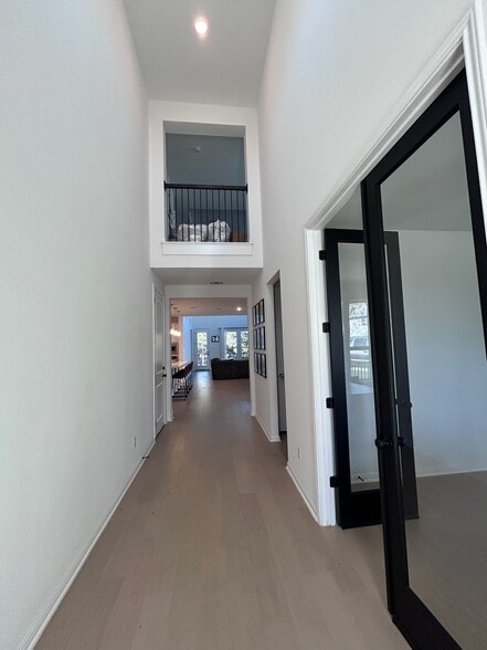Impressive entryway with soaring ceilings and abundant natural light. - 517 Moonlit Stream Pass