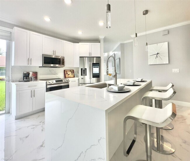 Building Photo - 3 br, 2.5 bath House - 8910 NW 45th Ct # 0