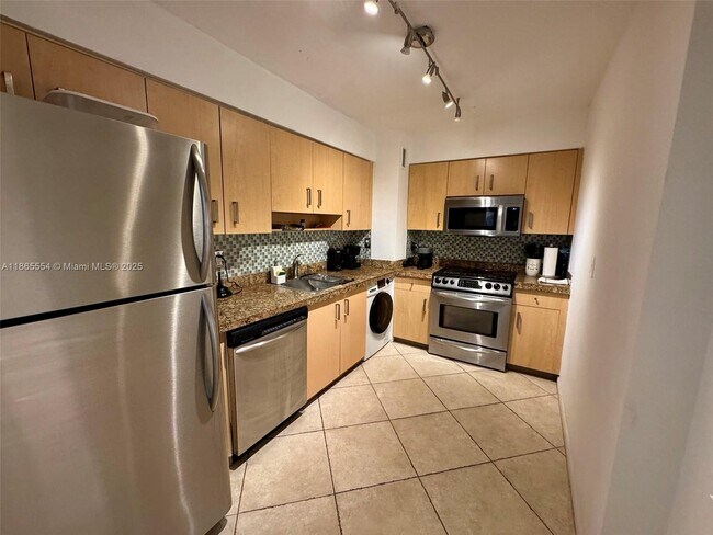 Building Photo - 9195 Collins Ave