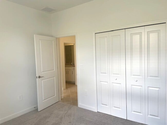 Building Photo - New Construction 2 Bedroom PLUS a Home Office Available in Lorraine Lakes