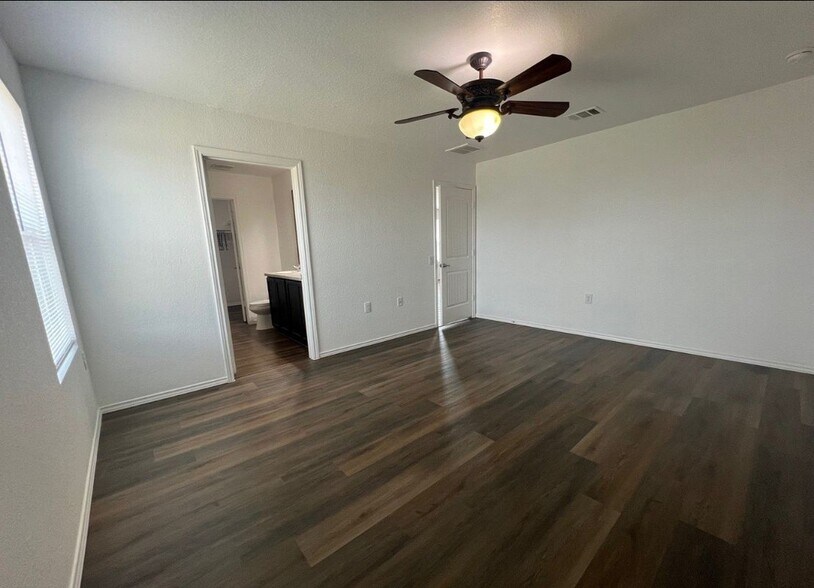 Building Photo - 7002 Cozy Run