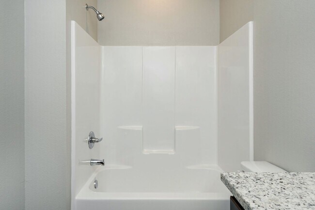 Building Photo - Live, love, and grow in this charming townhome!