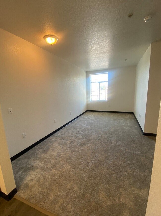 Building Photo - Miley Gardens at Eastmont- 55+ Senior Affordable Community