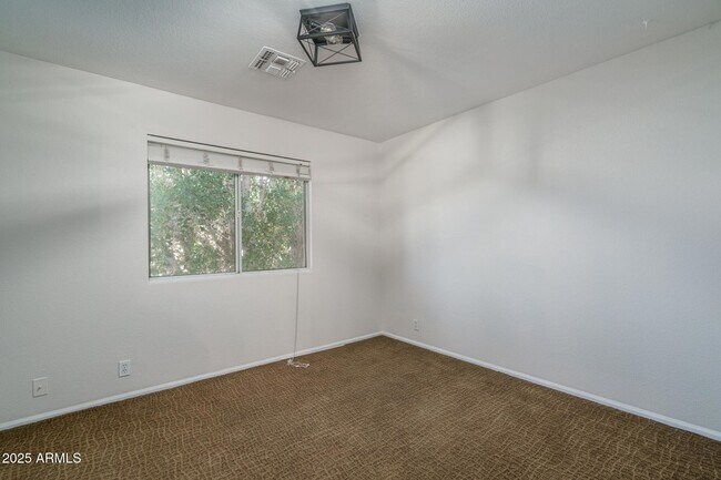 Building Photo - 5951 W Irma Ln
