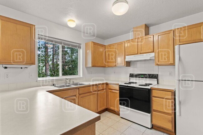 Building Photo - 1325 W Qualchan Dr