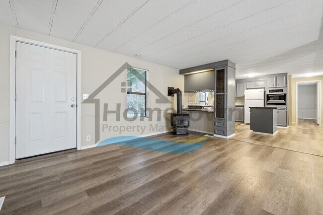 Building Photo - 2-Bedroom 2-Bathroom Home with Off-Street Parking Available in Coeur d’Alene!