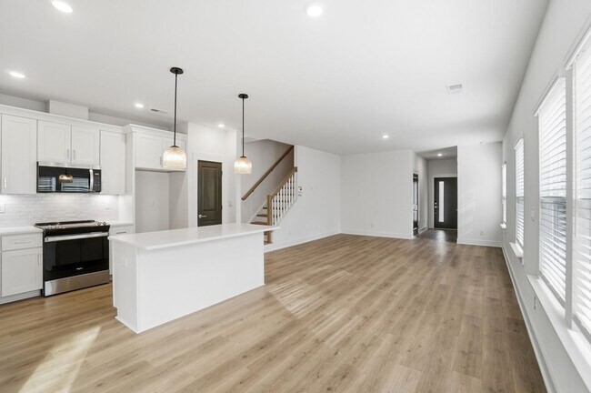 Building Photo - Bright & Modern New Construction Townhome