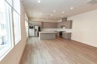 Building Photo - Experience contemporary urban living at its finest. Private Garage & Dual Suites!