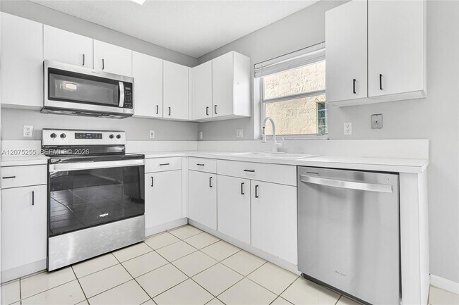 Building Photo - 3884 NW 63rd Terrace
