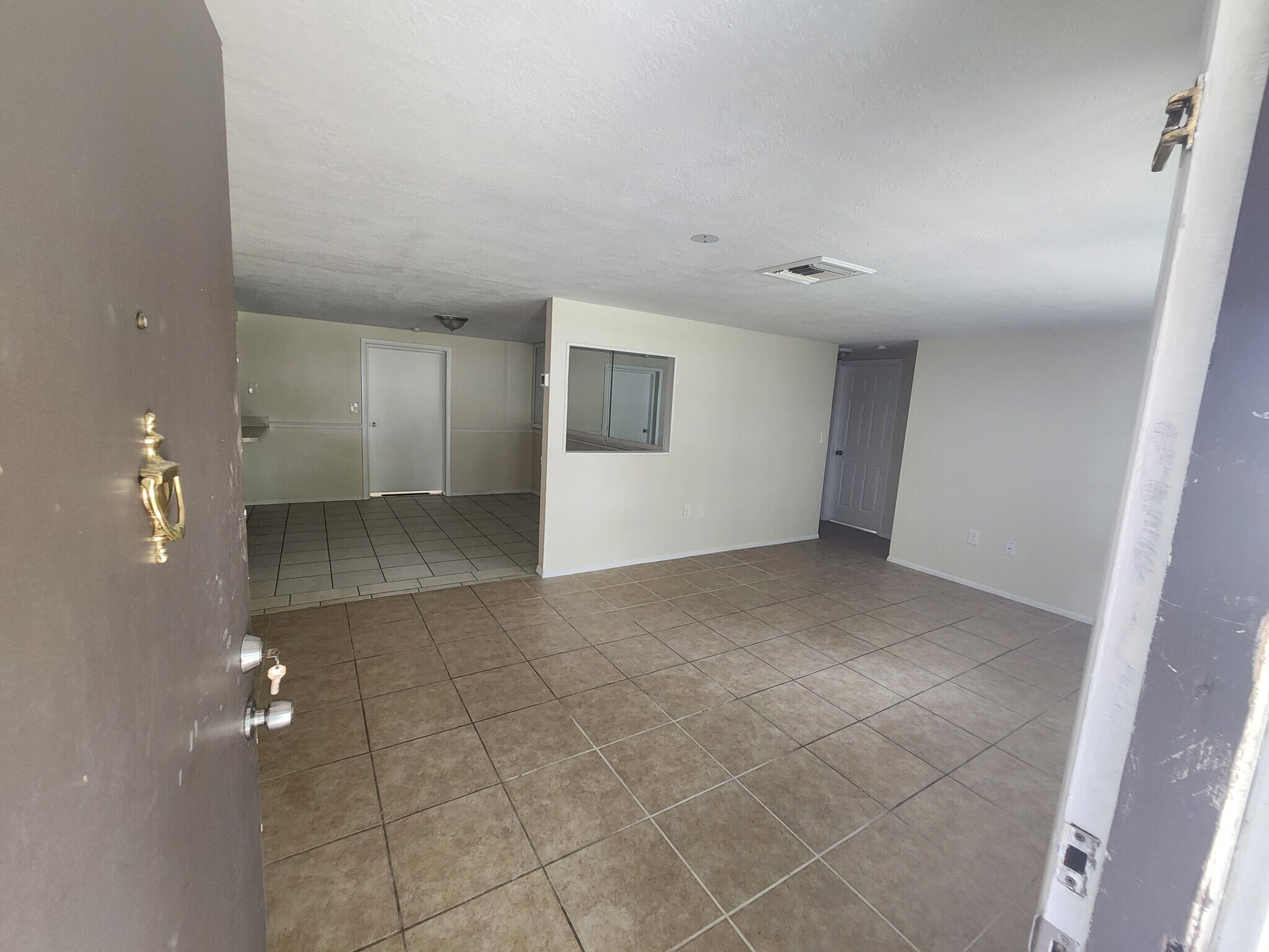 Front Door opens to Living Room - 7615 Tyson Dr