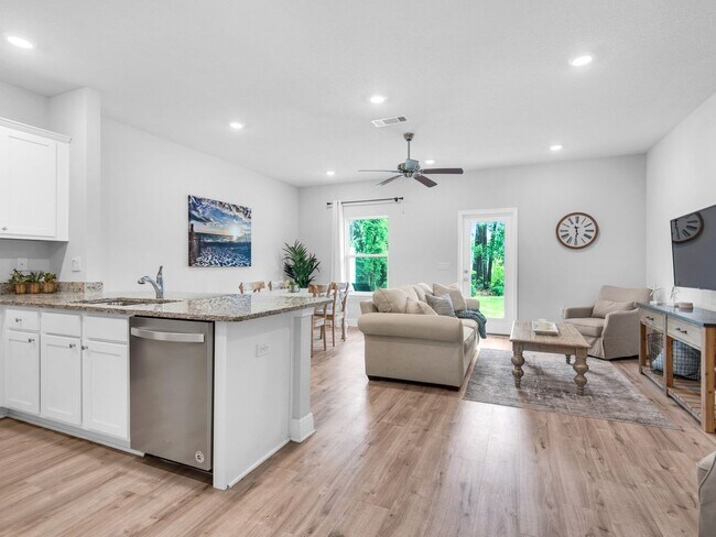 Building Photo - Brand New Furnished Townhome located just ...