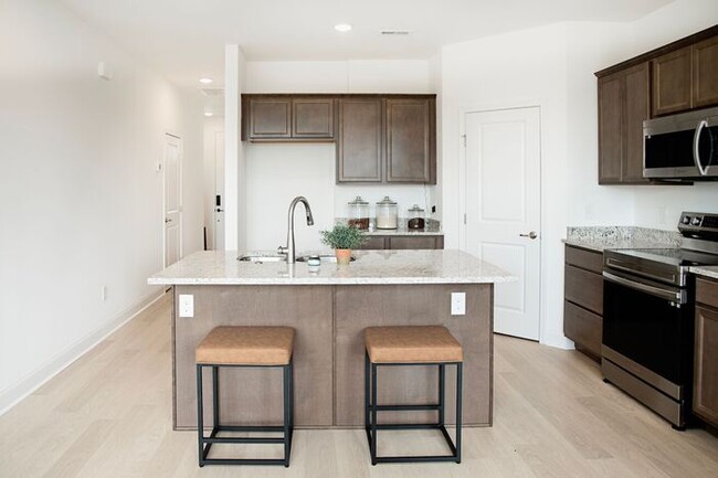 Building Photo - New Construction Townhomes Await at Clover...