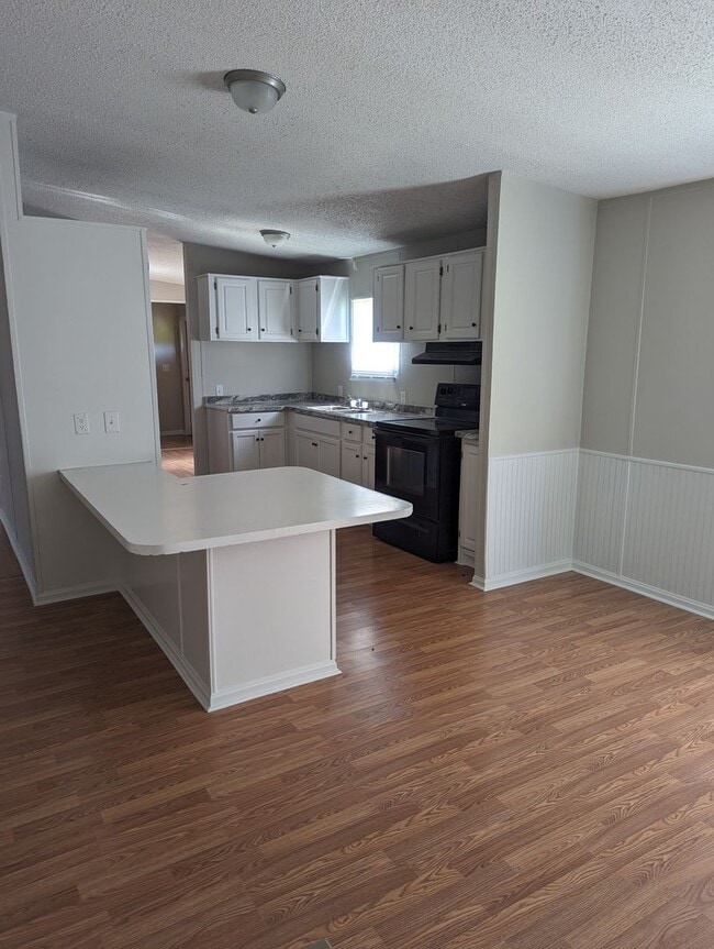 Building Photo - 4 BR, 2 BA 1,792 sq ft doublewide Trailer ...
