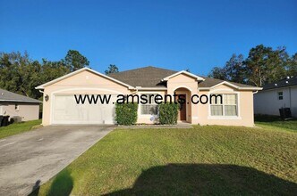 Building Photo - Large 4/2 Home With 2 Car Garage In Poinciana