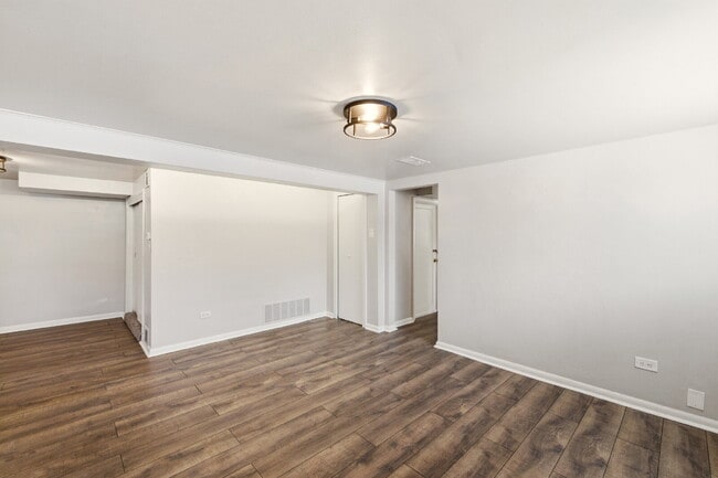 Building Photo - Price Drop! Renovated studio with garage + utilities included! Modern kitchen with island, update...