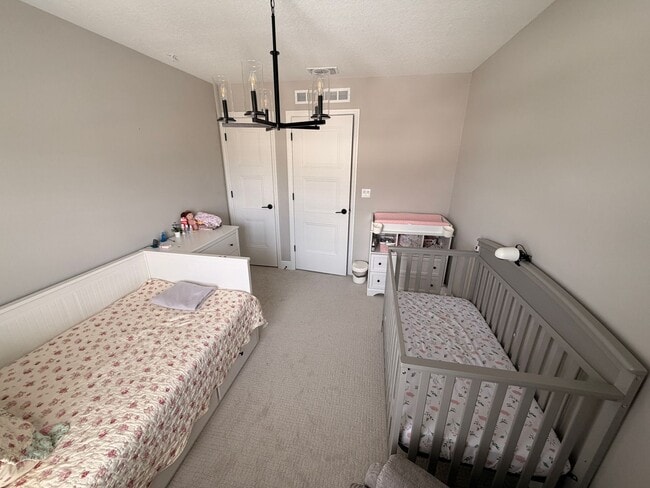 Building Photo - Elegant living in a vibrant, strategically located community—your perfect place to call home.