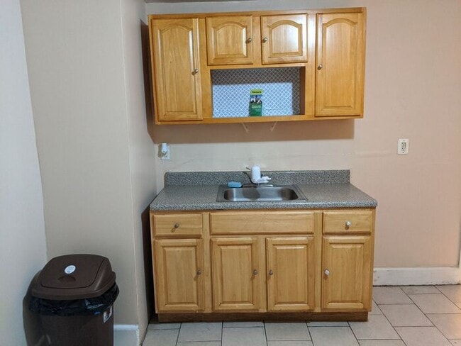 Building Photo - Three-Bedroom Apartment Near Public Transportation