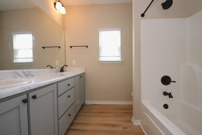Building Photo - Enjoy Country Living with Modern Comforts!  3BR/2BA Home  with Granite Countertops, Covered Porch...