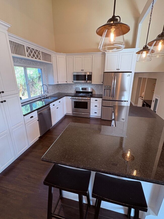 Building Photo - Upgraded 3 bedroom, 2 1/2 bath home with HUGE private yard.  This is a true hidden gem.