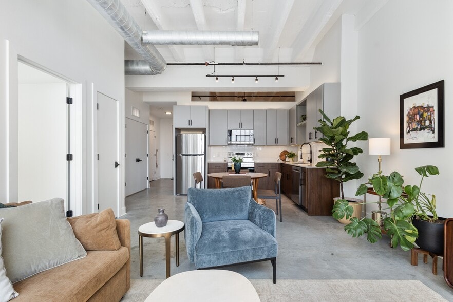 Exposed ductwork, exposed beams, nothing hidden overhead. - Cole Motor