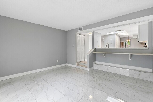 Building Photo - Fully Renovated 2-Bedroom Condo—Just 1 Mile from Universal!