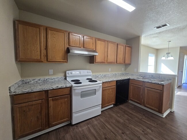 Building Photo - 10226 Country Hills Blvd