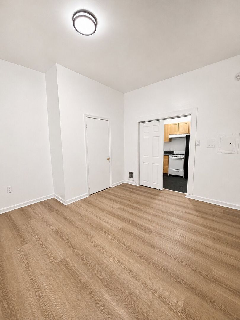 Building Photo - 7020 Woodland Ave